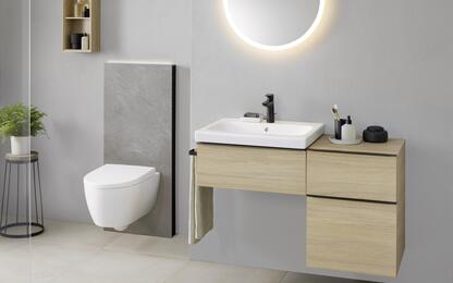 icon_bathroom_with_lay-on_washbasin_monolith_plus_light_on_wc_wall-hung_white_matt_option_mirror_round_60_light_on_sideview_original