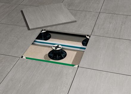 Pose de carrelage extérieur sur plots