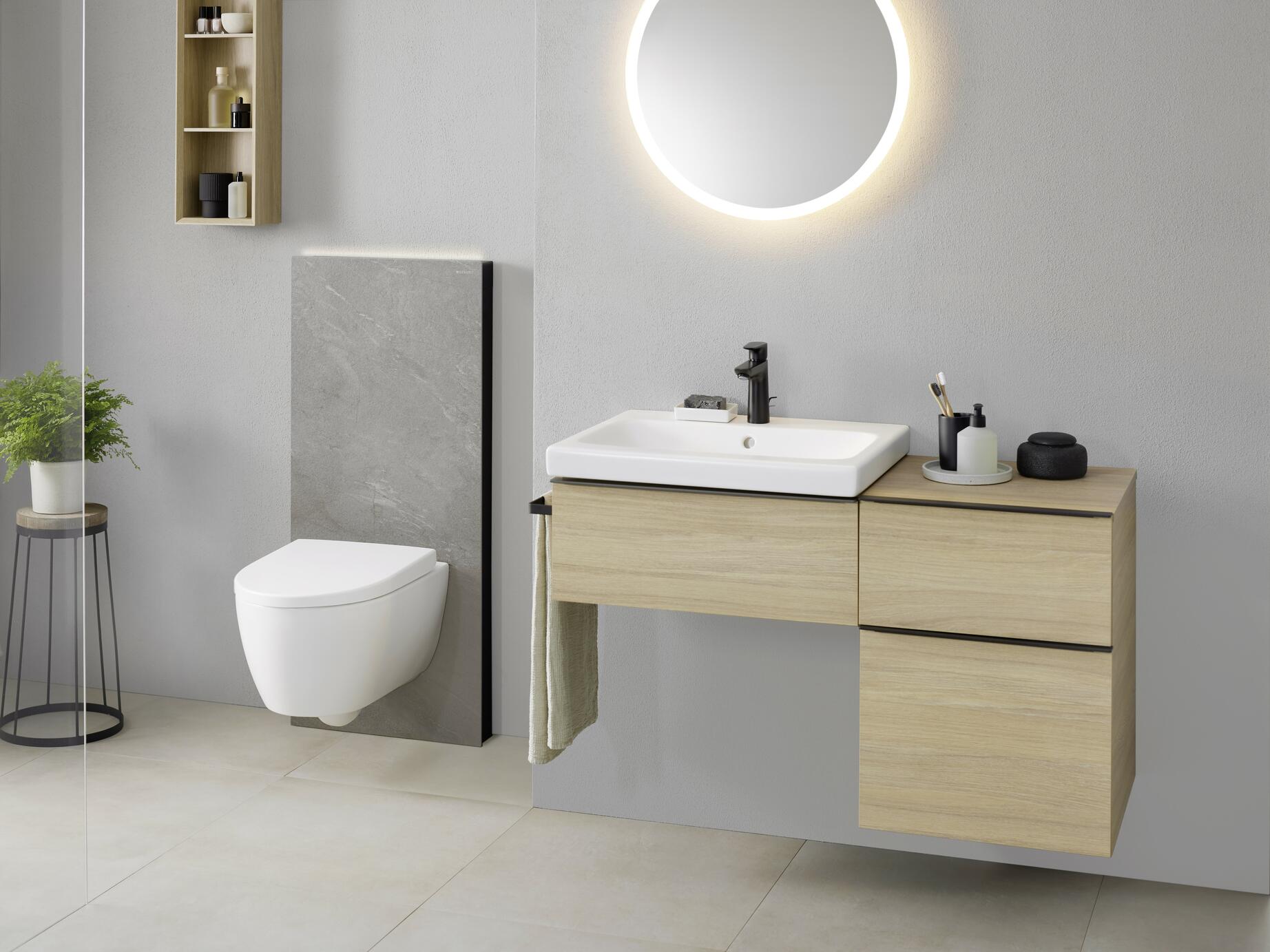 icon_bathroom_with_lay-on_washbasin_monolith_plus_light_on_wc_wall-hung_white_matt_option_mirror_round_60_light_on_sideview_original